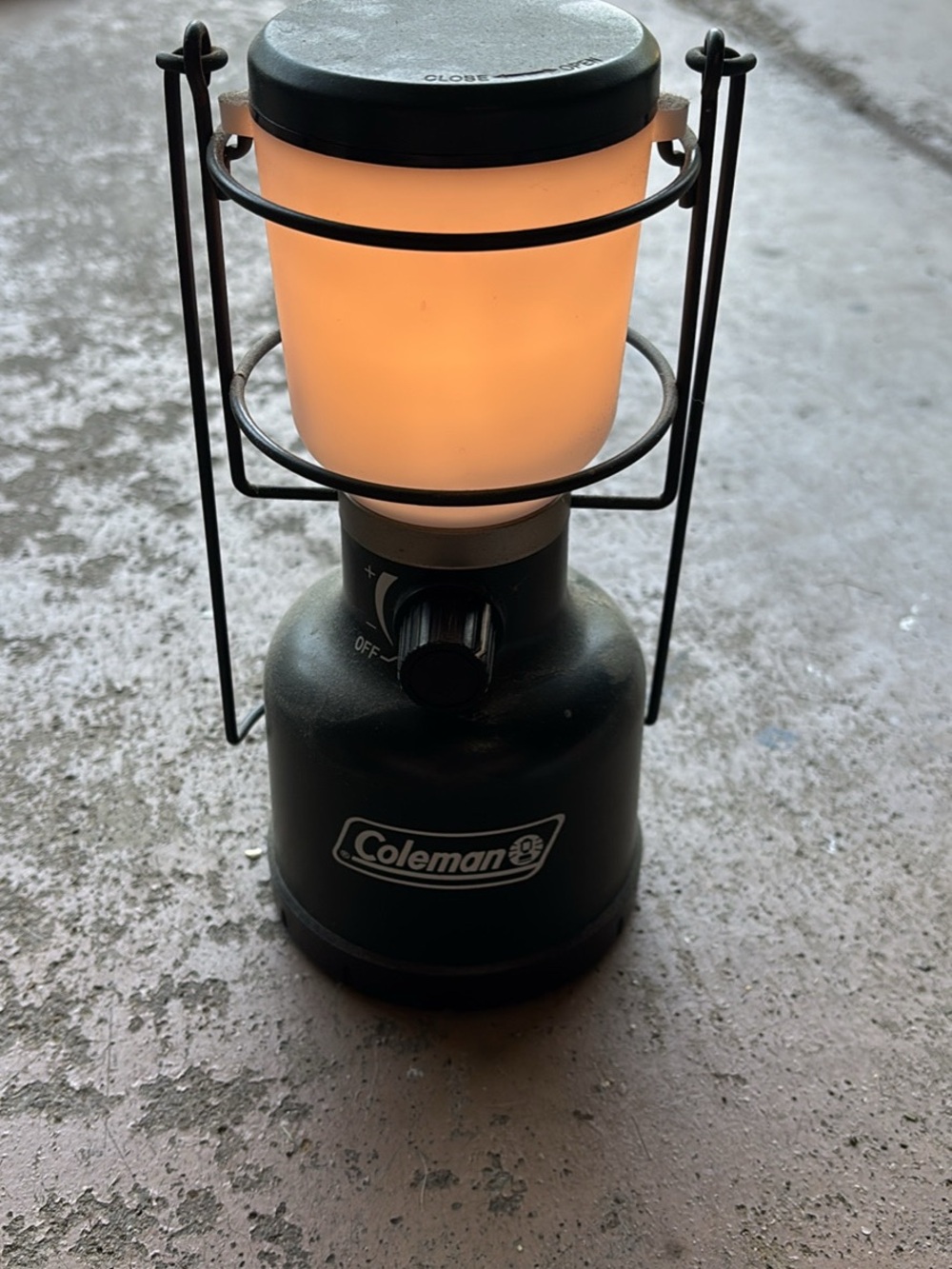 Coleman Olive Green Lantern with Warm Frosted Globe